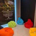 bean bags of different color in the quiet space of the milton keynes shopping centre in the Neurodiversity Hub